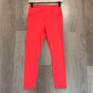 Fabletics Oasis PureLuxe High-Waisted
7/8 Crossover Leggings Orange Size
Medium